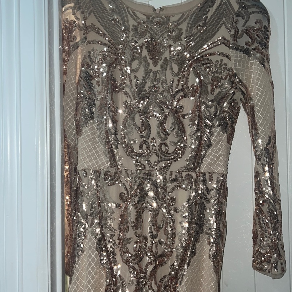 Selling a rosegold dress from Macy’s.
